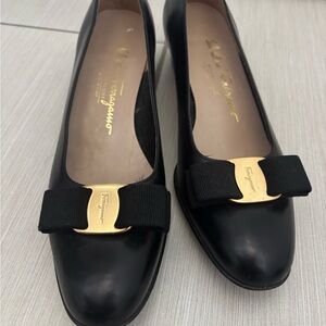 Salvatore Ferragamo Black and Gold Vara leather shoes